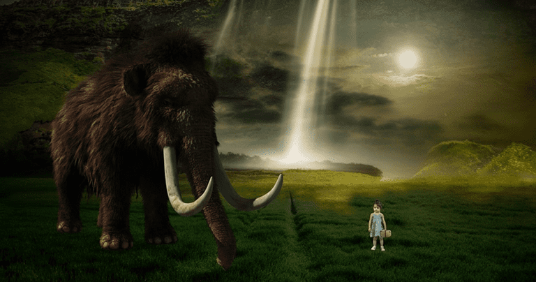 Mammouth et petite fille sur le gazon